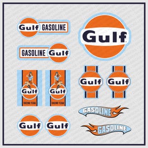 May include: A collection of Gulf Gasoline stickers featuring the iconic orange and blue circular logo. The sheet includes various designs, some with the text Gulf Gasoline, others featuring a pin-up style character and the text Racing Team.
