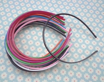 50 st. plastpannband i blandade färger, 4 mm brett