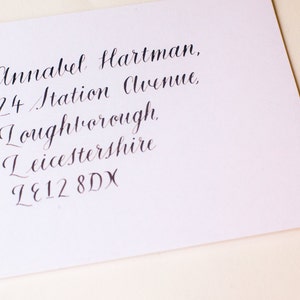 Hand written wedding envelopes in calligraphy
