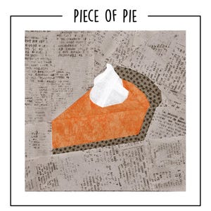 May include: A fabric quilt block titled PIECE OF PIE featuring a slice of orange pumpkin pie with a white dollop of whipped cream on top. The pie crust is brown with a star pattern, and the background is a beige fabric with black text.