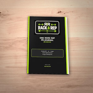 May include: A black journal with a lime green and white logo featuring the text RACK & REP. The cover displays the title ONE MORE REP PR JOURNAL, along with additional text detailing it as a printable PDF, A5 size, and 7 pages in total.