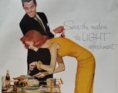 Modern Couple Thanksgiving Turkey Slicing Laughing Illustrated Sexy In Love Couple Red Head Slim 50s Pepsi. Ready Frame 13 x 10.
