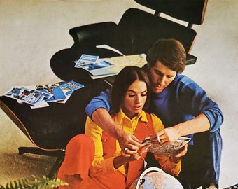Eames Lounge Chair Ad Couple Travel Plans Spacious Floor Herman Miller Classic Chair Mid Century Modern Color Photo 13x10 Ready for Frame