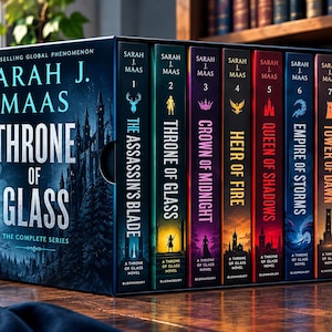 May include: A complete book series box set titled Throne of Glass by Sarah J. Maas. The set includes eight volumes with spines featuring distinct colors and illustrations, including The Assassin's Blade, Throne of Glass, Crown of Midnight, and others.