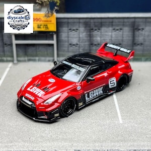 May include: A red and black 1:64 scale Nissan Skyline model car featuring a Liberty Walk body kit, a large rear spoiler, black wheels, and white decals including the text LBWK, Nissan, and the number 5 on the side door panel.