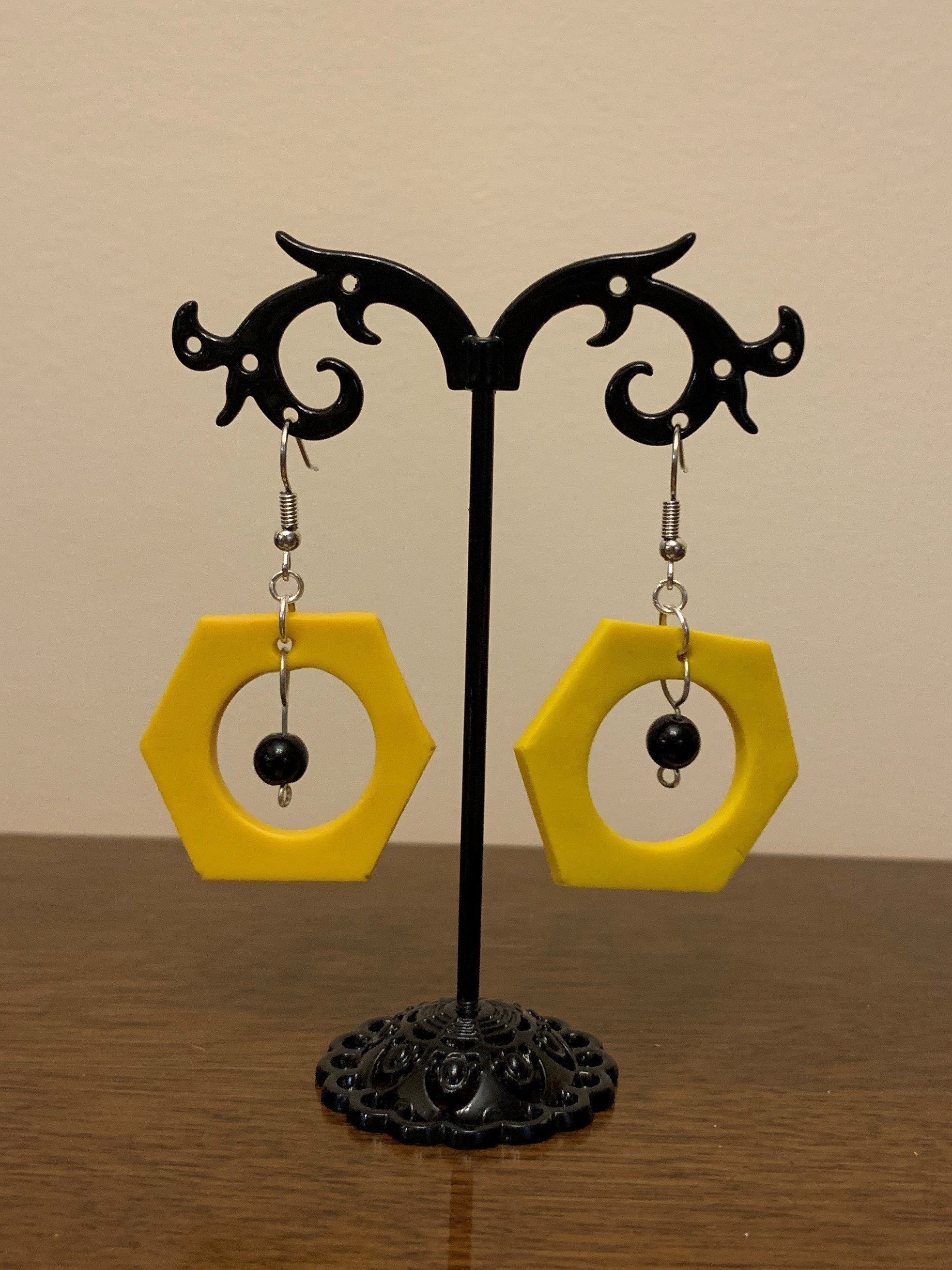 Meltan Earrings