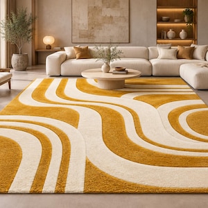 May include: A rectangular area rug featuring a high-pile texture with a repeating pattern of bold, mustard yellow and cream-coloured wavy lines that curve across the surface, creating a rhythmic, flowing design throughout the entire floor covering.