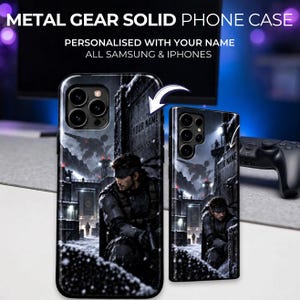 May include: Two phone cases featuring a Metal Gear Solid graphic with a character in a snowy environment, a large structure, and text that reads METAL GEAR SOLID PHONE CASE, PERSONALISED WITH YOUR NAME, ALL SAMSUNG & IPHONES, and YOUR NAME.