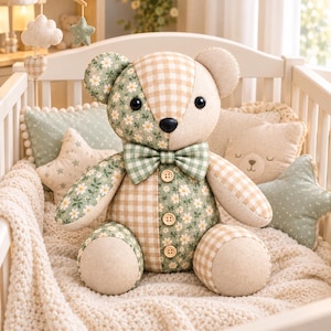 May include: A stuffed teddy bear featuring a patchwork design of sage green fabric with a white daisy floral print and beige gingham check fabric. The bear has a matching gingham bowtie, three round wooden buttons on its torso, and black eyes.