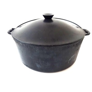 Lg #10 Wagner Ware Dutch Oven With Trivet - collectibles - by owner - sale  - craigslist