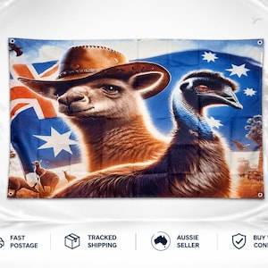 May include: A rectangular wall flag featuring a kangaroo wearing a brown leather cowboy hat and an emu standing in front of the Australian flag. The background displays a landscape with smaller kangaroos and a vehicle under a blue sky.
