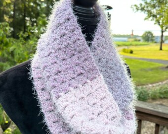 Textured infinity scarf in shades of purple from pale lilac to dark eggplant colors in a circular looping scarf