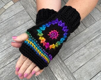 Sunflower Fingerless Gloves in jewel tone shades of pink, purple, blue, yellow and green with black borders