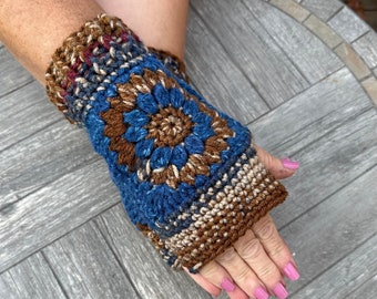 Sunflower Fingerless Gloves in shades of pale tan, brown and blue ombré with a blue accent blue sunflower Fingerless Gloves