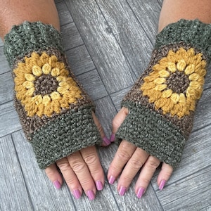 Sunflower Fingerless Gloves in traditional earth tones of brown, green, yellow and gold.