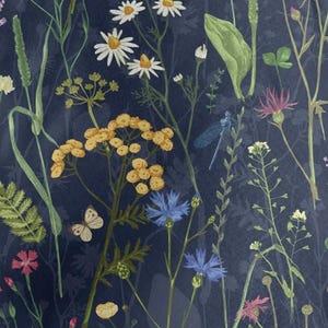 May include: A dark navy blue fabric featuring a botanical print of white daisies, yellow tansy clusters, blue cornflowers, and pink wildflowers. The pattern includes green stems, leaves, a small beige butterfly, and a blue dragonfly illustration.