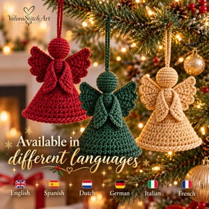 May include: Three crocheted angel ornaments in red, dark green, and beige, each featuring a round head, textured wings, and a conical body with a matching hanging loop. The text VeloraStitchArt and Available in different languages is visible.