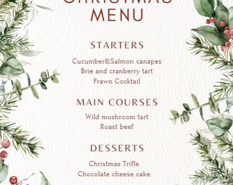 May include: A Christmas menu card featuring dark red text on a white background, framed by watercolour illustrations of green pine branches, eucalyptus leaves, and red berries, with a red ribbon bow at the bottom centre of the page.