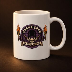 May include: A white ceramic mug featuring a circular graphic with a purple stone archway, a horned skull, two crossed swords, and two flaming torches. The text reads CRAWL CREW at the top and HALLOWEEN ONE-SHOT on a banner at the bottom.