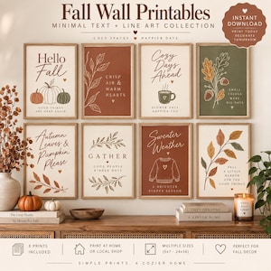 Peut inclure: Une collection de huit affiches murales rectangulaires présentant des illustrations au trait sur le thème de l'automne, des citrouilles, des feuilles et des phrases comme Hello Fall, Cozy Days Ahead et Sweater Weather dans des tons terre cuite, vert sauge et crème.