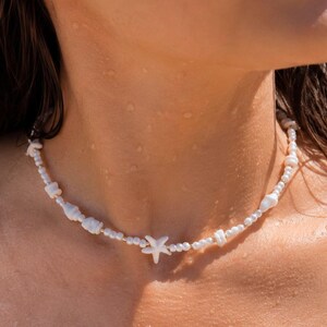 Fijne ovale schelpketting met schuifknoop in de vorm van een zeester | Boho strandketting van natuurlijke schelpen, handgemaakt in strandstijl