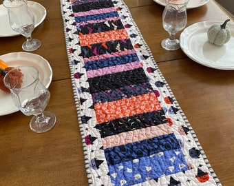Handmade Halloween Quilted table runner, Halloween cute cats table topper with Ruby Star Society fun prints with purple orange and black.