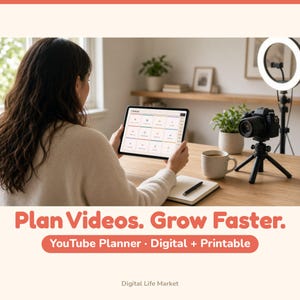 May include: A digital tablet displaying a YouTube planner dashboard with grid-based organization. The screen shows the text Plan Videos. Grow Faster. YouTube Planner · Digital + Printable. The device is held on a wooden desk with a camera.