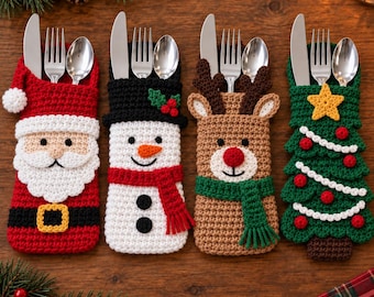 May include: Four crochet cutlery holders featuring holiday designs: a red Santa Claus with a white beard, a white snowman with a black hat and red scarf, a brown reindeer with a red nose and green scarf, and a green Christmas tree with a yellow star.