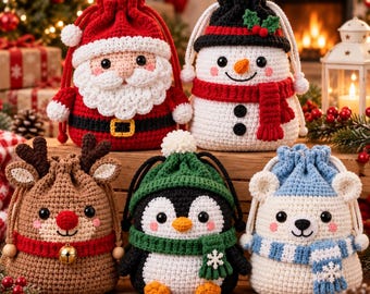 May include: Five crochet drawstring bags featuring holiday characters: a red Santa Claus, a white snowman with a black hat, a brown reindeer with a gold bell, a black and white penguin in a green hat, and a white polar bear with a blue scarf.