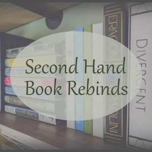 May include: A collection of books arranged on a shelf, featuring various spines with titles including Eragon, Divergent, Treasure Island, and Moby Dick. The text Second Hand Book Rebinds is overlaid in the center of the image over the book spines.