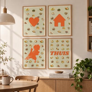 May include: A set of four framed wall art prints with a light green background featuring a repeating pattern of small food illustrations. The prints display a large orange heart, an orange house icon, an orange map of the Netherlands, and the word THUIS.