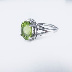 engagement rings with peridot, peridot birthstone rings, sterling silver peridot ring, green engagement rings, statement ring