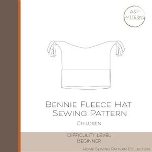 May include: Line drawing of a fleece hat sewing pattern for children. The pattern includes a hat with ties and is labelled "Bennie Fleece Hat Sewing Pattern" and "Children". The difficulty level is listed as "Beginner".