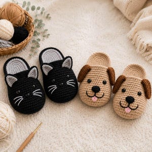May include: Two pairs of handmade crochet slippers, one pair shaped like black cats with grey inner ears and white whiskers, and one pair shaped like tan dogs with brown floppy ears, black noses, and small pink tongues, all featuring black bead eyes.