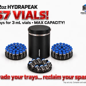 May include: A black 32oz Hydrapeak container with three circular black trays holding 3 mL vials with blue caps. Text reads: 32oz HYDRAPEAK 67 VIALS! Trays for 3 mL vials • MAX CAPACITY! Upgrade your trays... reclaim your space!