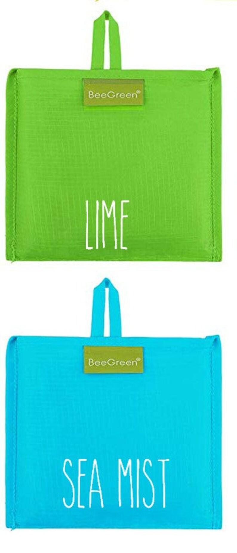 May include: Two reusable shopping bags with a lime green and a blue color. The bags have a white BeeGreen logo and the words "Lime" and "Sea Mist" printed on them.