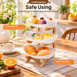 May include: A three-tier serving stand with white oval bowls and a light wood frame. The stand holds various pastries and cakes. Text on the image includes TradeSupplieso, Safe Using, Extending the Freshness Period of Food, Food Grade PP, and Open Structure.