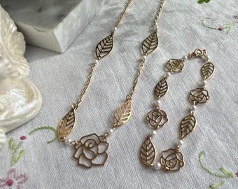 Vintage gold tone pearl, rose and leaf motif necklace and bracelet set
