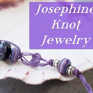 May include: A purple and silver beaded bracelet with a knotted cord, displayed on a white seashell. The text "Josephine Knot Jewelry" is in white letters on a purple background.