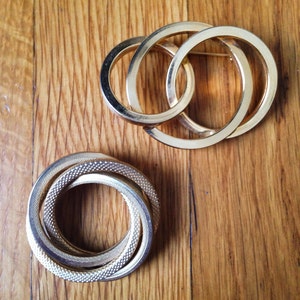 Set Of Two Gold Circular Pins 1990s