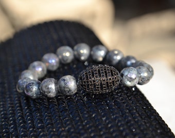 Splendido, braccialetto di pietre preziose di fantasia con perlina centrale in strass, strass nero, carbone, bracciali scintillanti