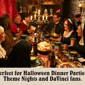May include: A group of people dressed in medieval costumes are seated around a candlelit table, enjoying a meal. The scene is set in a dimly lit room with red curtains and stone walls, creating a festive atmosphere.