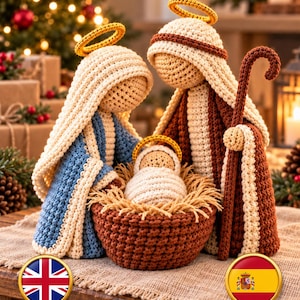 May include: A crochet nativity set featuring three figures with yellow halos. One figure wears a blue and cream robe, another wears a brown and cream robe with a staff, and a small figure rests in a brown basket filled with tan yarn straw.