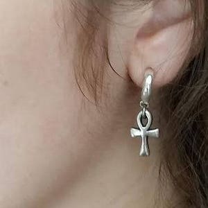 4 Earrings Man Individual 1 Ring With Cross Hanging 1 Ring With Feather Hanging 1 Stainless Steel More 1 Earring Wooden