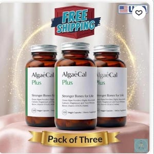 May include: Three amber glass bottles of AlgaeCal Plus dietary supplements with silver screw-on caps. Each white label features the text AlgaeCal Plus, Stronger Bones for Life, and 120 Veggie Capsules. A gold banner at the bottom reads Pack of Three.