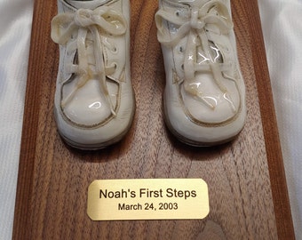 Style 1000W Preserved baby shoe on wood base