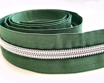 Groen/zilveren rits met 3 ritstrekkers, 100 cm.