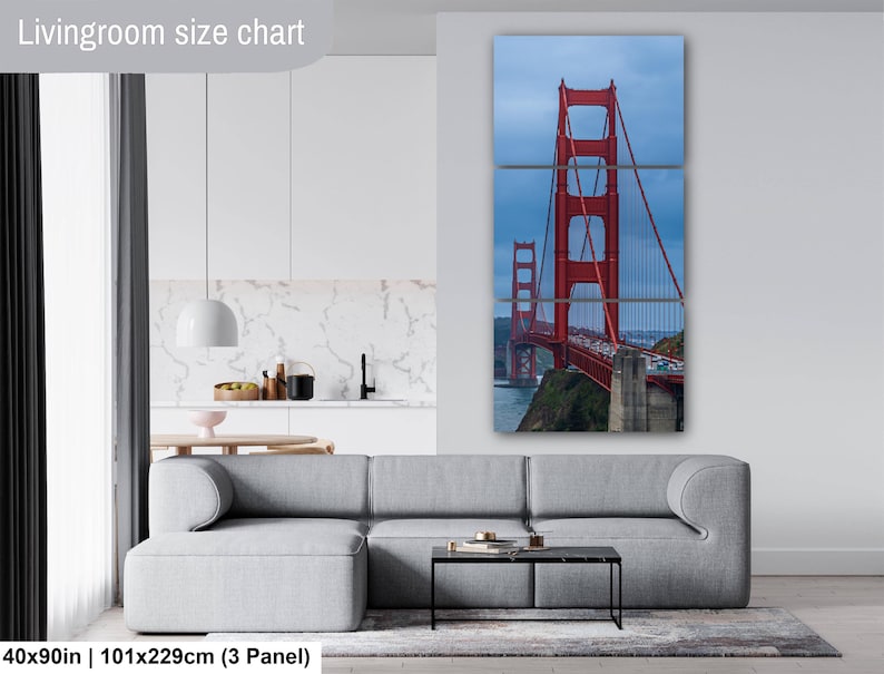 May include: A three-panel wall art set depicting the red Golden Gate Bridge against a blue sky. The text "Livingroom size chart" appears at the top left, and "40x90in | 101x229cm (3 Panel)" is printed at the bottom left of the image.