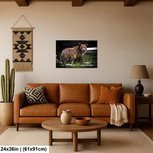 May include: A rectangular wall art print featuring a brown grizzly bear standing in a snowy, grassy landscape. The artwork measures 61 cm by 91 cm and is displayed in a horizontal orientation on a neutral-coloured wall.