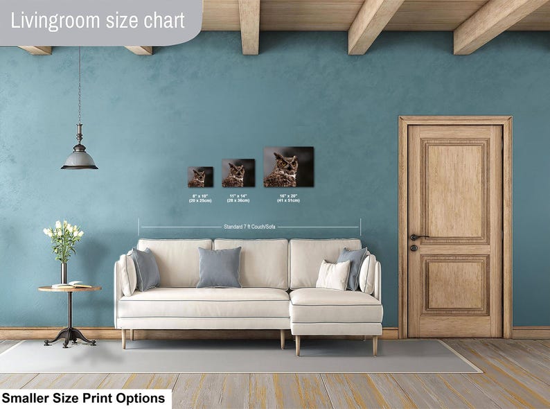 May include: A living room size chart displaying three rectangular wall art prints of an owl in sizes 8 by 10 inches, 11 by 14 inches, and 16 by 20 inches, positioned above a cream-colored sectional sofa with gray throw pillows and a side table.